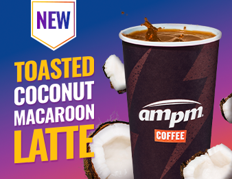 The new Toasted Coconut Macaroon Latte surrounded by chunks of coconut