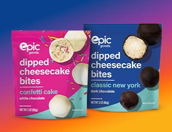 A bag of white chocolate epic goods Cheesecake Bites and a bag of dark chocolate epic goods Cheesecake Bites.