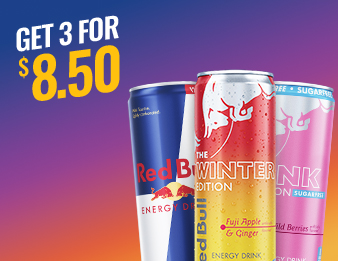 A can of Original Red Bull, Pink Wild Berries Red Bull, and Fuji-Apple Ginger Red Bull.